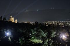 Athens at night with Odeon of Herodes Atticus and Mount Hymettus