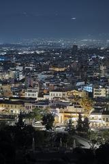 Athens night view with Odeon of Agrippa and mount Parnes