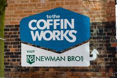 Newman Brothers Museum sign