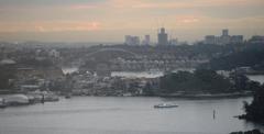 Distant view of Gladesville Bridge at dusk from Sydney Harbour Bridge