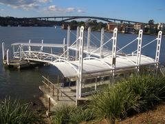 Chiswick Ferry Wharf on Parramatta River with Gladesville Bridge in background