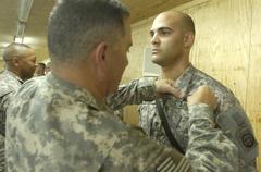 Maj. Gen. Scaparrotti awards Combat Action Badge to Spc. Carlos Lopez-Correa in Baghdad