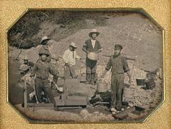 5 miners taking a break from gold panning to pose for the camera during California’s Gold Rush sesquicentennial.