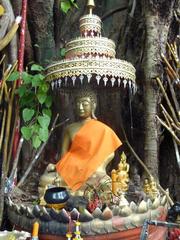 statue under the Bodhi tree in Wiang Kum Kam, Chiang Mai Province