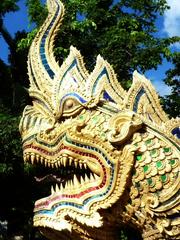 Dragon sculpture guarding steps at Wiang Kum Kam, Thailand