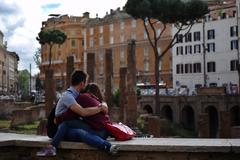 A couple sharing a romantic moment in Rome