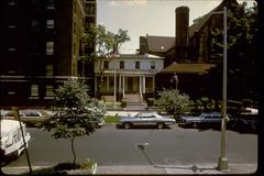 Hamilton Grange between an apartment building and St. Luke's Church