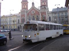 Plzeň tram in service on a street in the city