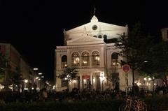 Gärtnerplatz at night with illuminated Gärtnerplatztheater in the background