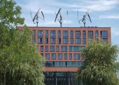 Three Darrieus rotors on the Greenpeace headquarters