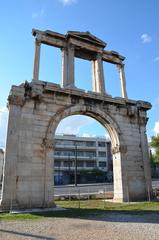 Arch of Hadrian from southeast side facing Olympeion in Athens with ancient Greek inscription