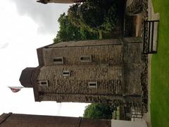 Jewel Tower in London with a lush green foreground