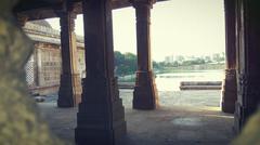 Beautiful view of Lake at Sarkhej Roza through mosque carvings