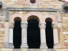 Rear window of Santa María de Bendones Church with columns and arches