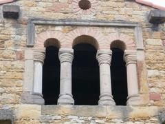 Iglesia de Santa María de Bendones rear window with columns and arches