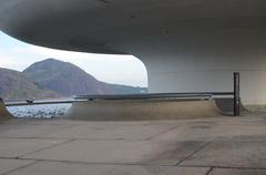 Museu de Arte Contemporânea de Niterói with cloudy sky at sunset