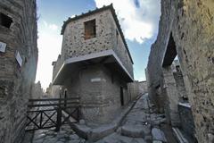 Ruins in Pompeii with Mount Vesuvius in the background