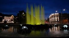 Hochstrahlbrunnen illuminated at night in Vienna