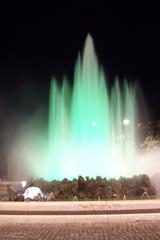 Hochstrahlbrunnen fountain illuminated in green at night