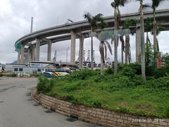 Stonecutters Island container port and Stonecutters Bridge in June 2024