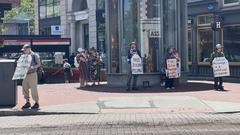 Demonstration calling for Julian Assange to be freed at Harvard Square