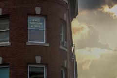 Dewey Cheetham & Howe office sign in Harvard Square