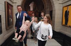 Andrew Scheer walking with his family