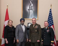 U.S. Marine Corps Gen. Joe Dunford poses for a photo with Canadian officials before talks in Canadian Parliament buildings