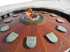 Centennial Flame with provincial shields of Northwest Territories, Yukon, British Columbia, Alberta, and Saskatchewan