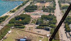 view of Lollapalooza music festival with large crowd and stage