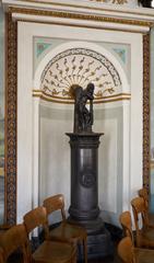 a historic wood stove in the Festsaal of Stapel Manor