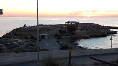 Panoramic view of Illeta dels Banyets archaeological site at sunrise