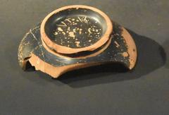 Fragment of Attic pottery with Greco-Iberian inscription from the 4th century BC