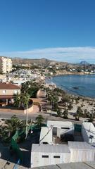 View of the construction cabins at the Illeta dels Banyets archaeological site, with part of the town and northern beaches from the roof of Torre de la Illeta de l'Horta in El Campello