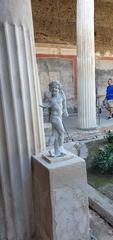 House of the Vettii statue in Pompeii