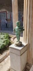 Bronze Cupid with a duck fountain sculpture from the House of the Vettii in Pompeii