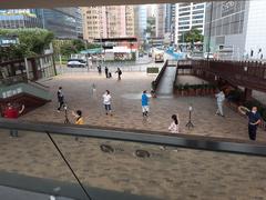 View of Kwun Tong Promenade Garden with skyscrapers in the background