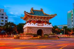 Taipei's Xiaonanmen South Gate at night with car light trails