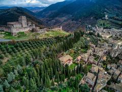 Scenic view of Assisi with historic buildings and green hillside