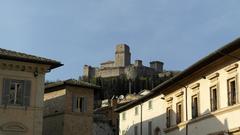 Scenic view of Assisi with historical buildings and rolling hills