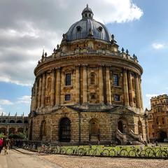 Radcliffe Square in Oxford with historic buildings and clear blue sky