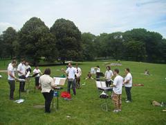 Aaron Siegel conducts glockenspiel players in East Meadow