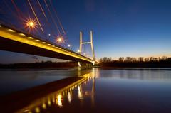 Siekierkowski Bridge over Vistula River in Warsaw during blue hour