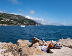 Couple at Porporela pier in Dubrovnik, Croatia