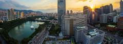 Lotte World Tower with Seoul's skyline at sunset