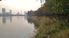 Seokchon Lake Park with walking path and lush greenery