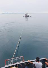 BRP Ivatan assisting distressed motor banca near Lampinigan Island