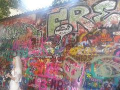 John Lennon Wall in Prague covered with colorful graffiti