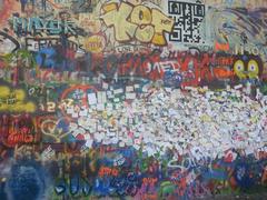 John Lennon Wall, Prague, with vibrant graffiti and paintings