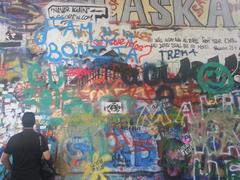 John Lennon Wall in Prague full of colorful graffiti and street art